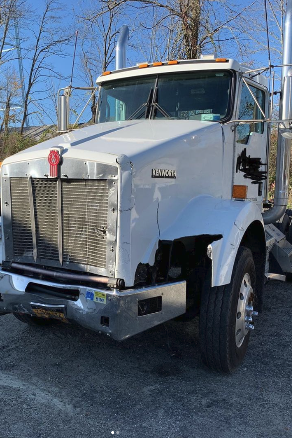 White truck at TwinFor Collision & Automotive shop located in Riverhead, New York